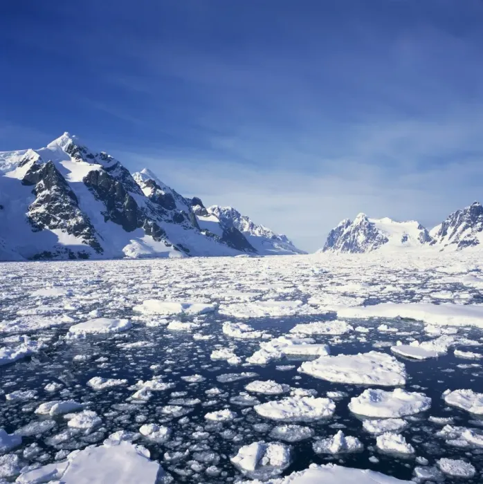 Framed Print : Loose pack ice in the sea, with the Antarctic Peninsula in the background Framed Print : Loose pack ice in the sea, with the Antarctic Peninsula in the background
