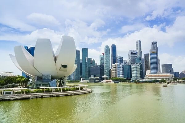 The lotus flower shaped ArtScience Museum overlooking Marina Bay and the financial district skyline