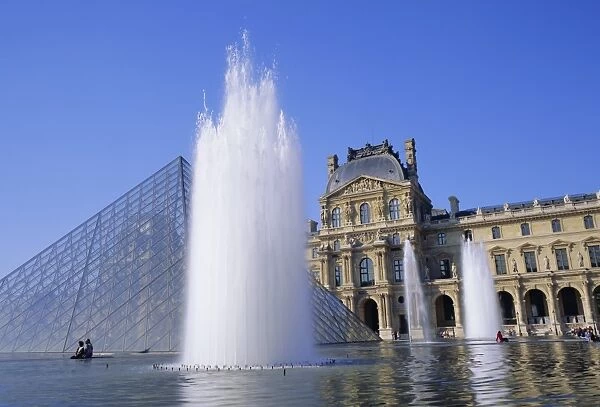 The Louvre fountains and pyramid, Paris, France, Europe