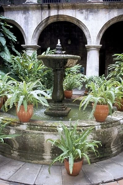 One of many lovely garden courtyards in Old Havana, Havana, Cuba, West Indies