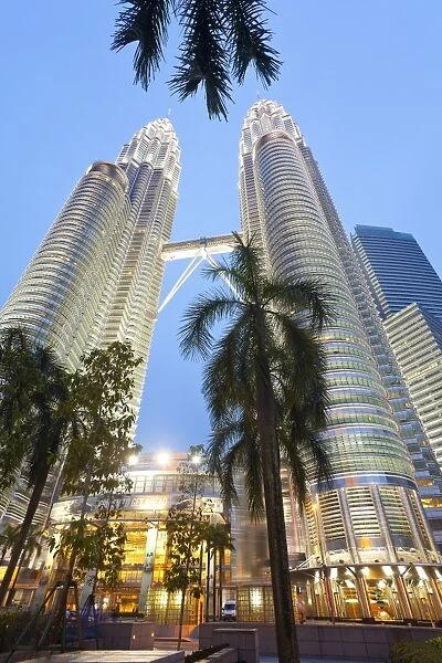 Low angle view of the Petronas Twin Towers, Kuala Lumpur, Malaysia, Southeast Asia, Asia