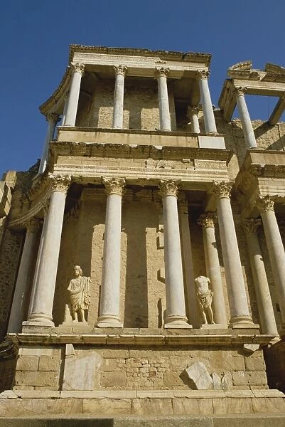 Low angle view of statues and columns on a building