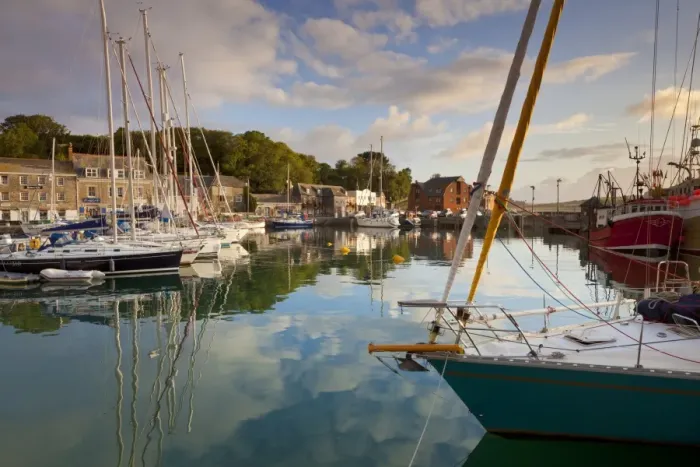 Framed Print : Low morning light and sailing yacht reflections at Padstow Harbour, Cornwall Framed Print : Low morning light and sailing yacht reflections at Padstow Harbour, Cornwall