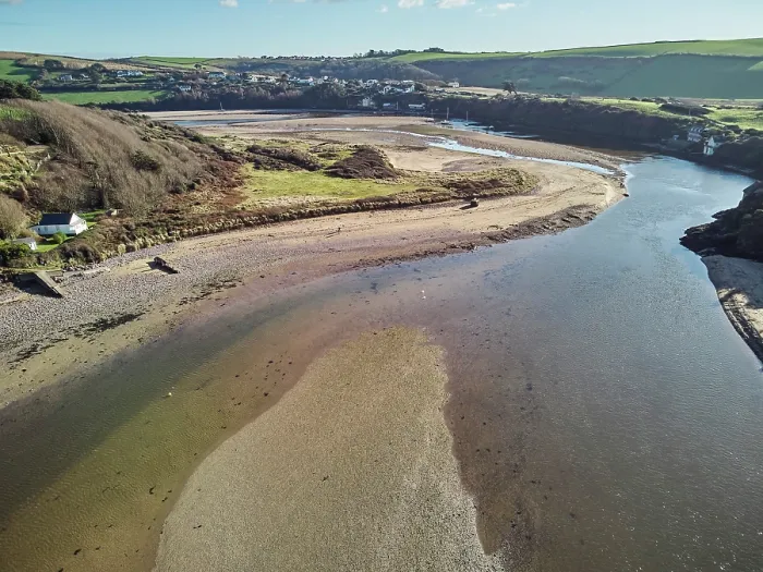 Framed Print : A low tide aerial drone view of the sandy shore and sand banks in the estuary of the River Avon, at Bantham, on the south coast of Devon, Great Britain Framed Print : A low tide aerial drone view of the sandy shore and sand banks in the estuary of the River Avon, at Bantham, on the south coast of Devon, Great Britain