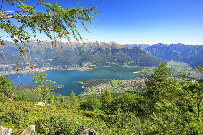 Framed Print : Lower Valtellina and blue Lake Como view from the green meadows of Monte Legnoncino, Lombardy, Italy Framed Print : Lower Valtellina and blue Lake Como view from the green meadows of Monte Legnoncino, Lombardy, Italy