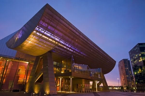 The Lowry Centre illuminated in the early evening, Salford Quays, Greater Manchester