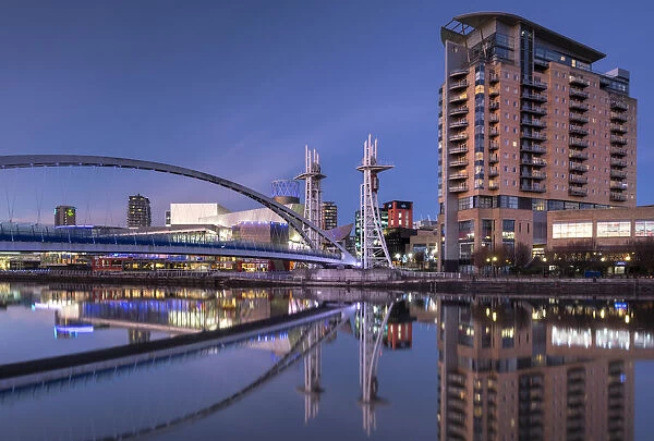 The Lowry Footbridge, Imperial Point Building and Lowry Centre at night, Salford Quays, Salford, Manchester, England, United Kingdom, Europe