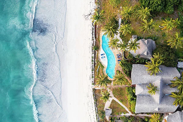 Luxury resort with swimming pool on a palm fringed beach, aerial view, Zanzibar, Tanzania, East Africa, Africa