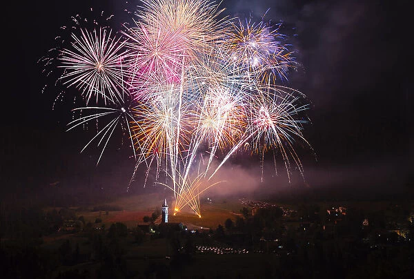 Magnificent fireworks over a small countryside church in Val d'Aiano, Emilia Romagna, Italy, Europe