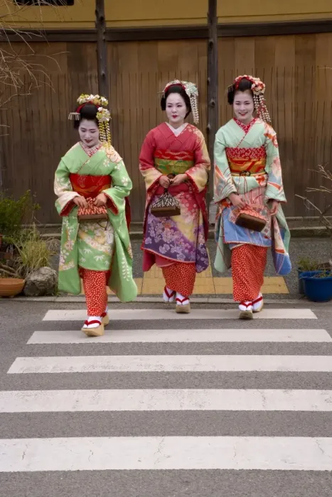 Framed Print : Maiko (apprentice geisha) walking in the streets of Framed Print : Maiko (apprentice geisha) walking in the streets of