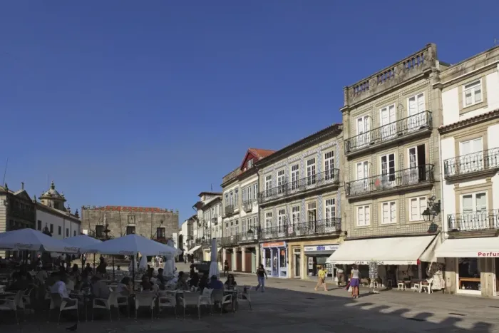 Framed Print : The main square (Praca da Republica), with street cafes and azulejo clad buildings Framed Print : The main square (Praca da Republica), with street cafes and azulejo clad buildings