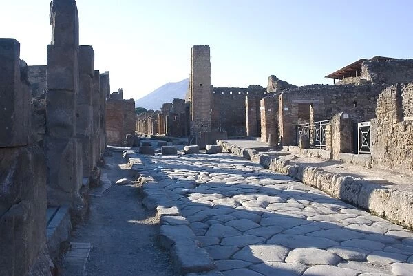 One of the main streets of the ruins of the Roman site of Pompeii, UNESCO World Heritage Site