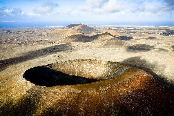Majestic crater of Hondo volcano (Calderon Hondo) with the ocean in background, Corralejo, Fuerteventura, Canary Islands, Spain, Atlantic, Europe