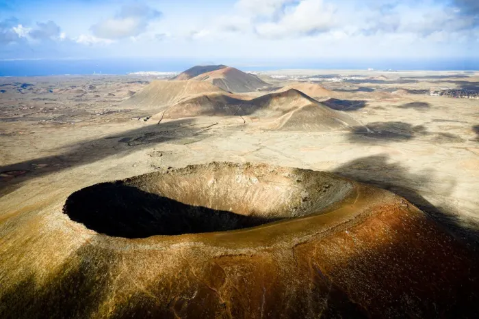 Framed Print : Majestic crater of Hondo volcano (Calderon Hondo) with the ocean in background, Corralejo, Fuerteventura, Canary Islands, Spain, Atlantic, Europe Framed Print : Majestic crater of Hondo volcano (Calderon Hondo) with the ocean in background, Corralejo, Fuerteventura, Canary Islands, Spain, Atlantic, Europe