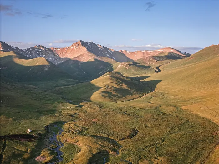 Framed Print : Majestic landscapes of Song Kol area showcasing mountains, valleys, and winding rivers during golden hour light Framed Print : Majestic landscapes of Song Kol area showcasing mountains, valleys, and winding rivers during golden hour light