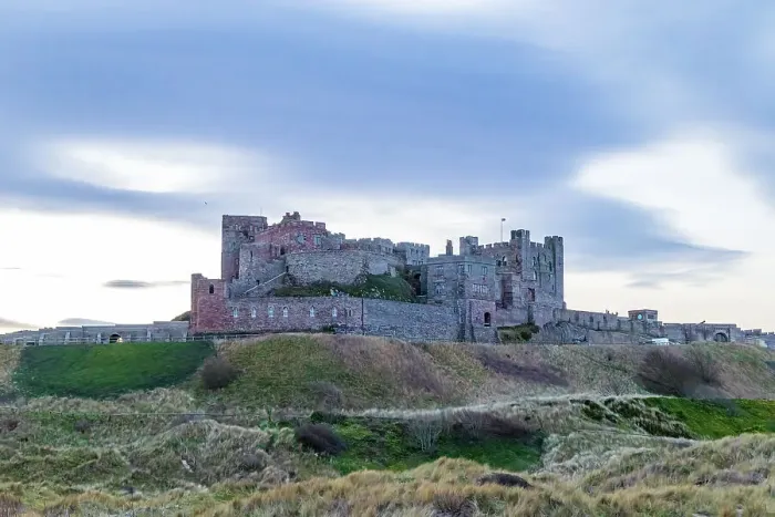 Framed Print : Majestic medieval castle on a hill with cloudy sky at dusk, showcasing historical architecture, Northumberland, England, United Kingdom, Europe Framed Print : Majestic medieval castle on a hill with cloudy sky at dusk, showcasing historical architecture, Northumberland, England, United Kingdom, Europe
