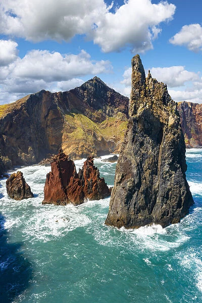 Majestic pinnacle of sea stack rock hit by waves, Sao Lourenco viewpoint, Canical