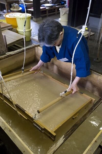 Making traditional Japanese washi paper at Echizen Washi No Sato village in Fukui