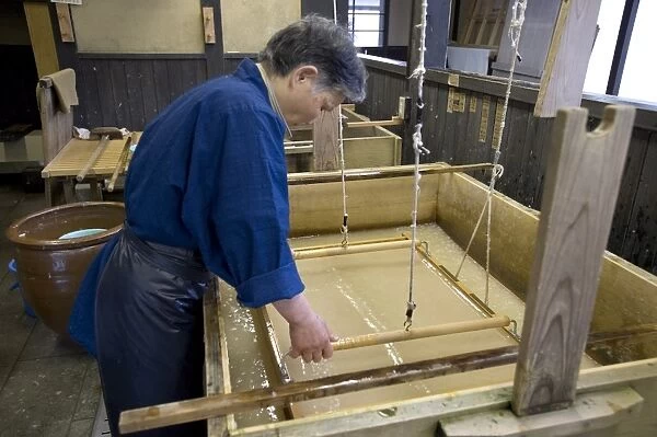Making traditional Japanese washi paper at Echizen Washi No Sato village in Fukui