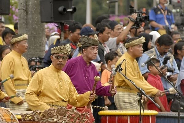 Malay men wearing traditional dress