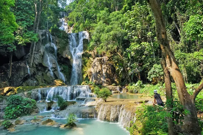 Framed Print : Man admiring the Kuang Si waterfalls, Luang Prabang, Laos Framed Print : Man admiring the Kuang Si waterfalls, Luang Prabang, Laos
