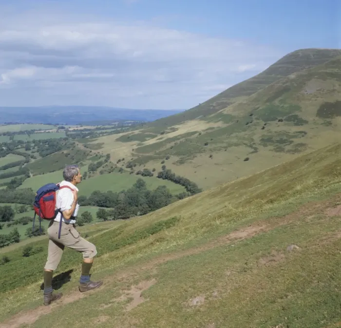 Framed Print : Man ascending Y Grib with Mynydd Bychan in the background, The Black Mountains Framed Print : Man ascending Y Grib with Mynydd Bychan in the background, The Black Mountains