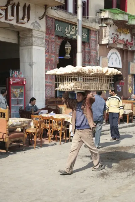 Framed Print : Man carrying bread, Alazhar Square, Cairo, Egypt, North Africa, Africa Framed Print : Man carrying bread, Alazhar Square, Cairo, Egypt, North Africa, Africa