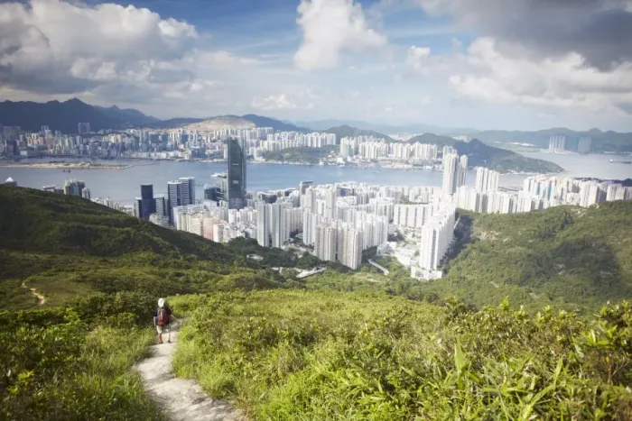 Framed Print : Man hiking on trail through hills behind Quarry Bay, Hong Kong, China, Asia Framed Print : Man hiking on trail through hills behind Quarry Bay, Hong Kong, China, Asia
