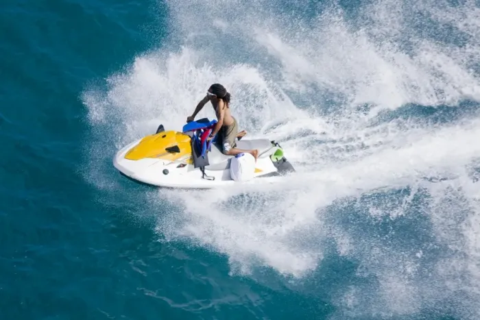 Framed Print : Man on a jet ski, Nassau harbor, New Providence Island, Bahamas, West Indies, Central America Framed Print : Man on a jet ski, Nassau harbor, New Providence Island, Bahamas, West Indies, Central America