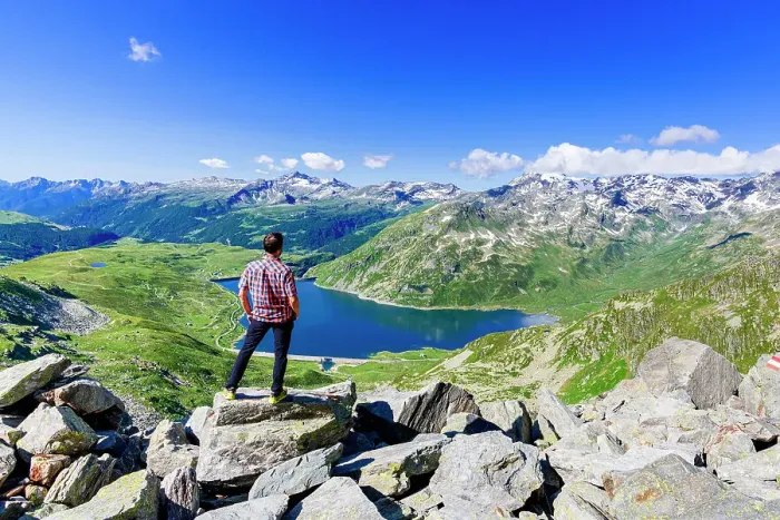 Framed Print : One man looking at the alpine lake of Montespluga standing on rocks, Madesimo, Valle Spluga, Valtellina, Lombardy, Italy, Europe Framed Print : One man looking at the alpine lake of Montespluga standing on rocks, Madesimo, Valle Spluga, Valtellina, Lombardy, Italy, Europe