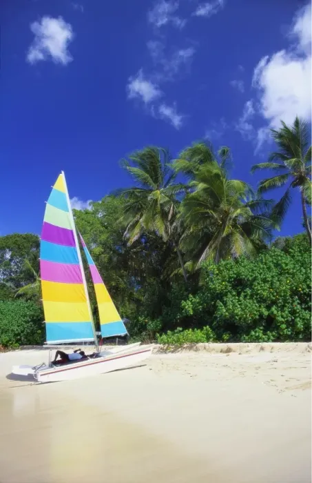 Framed Print : Man Lying on His Sailing Boat at St James Beach, Barbados, Caribbean Framed Print : Man Lying on His Sailing Boat at St James Beach, Barbados, Caribbean
