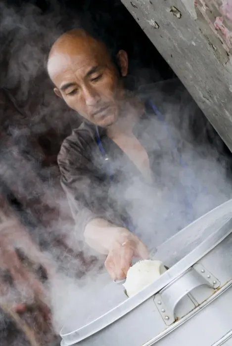Framed Print : Man making Baozi (dumplings), Dali old town, Dali, Yunnan, China, Asia Framed Print : Man making Baozi (dumplings), Dali old town, Dali, Yunnan, China, Asia