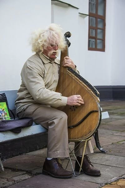 Man playing the traditional Bandura instrument, St. SophiaA