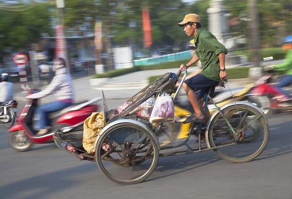 Man riding cyclo, Hue, Thua Thien-Hue, Vietnam, Indochina, Southeast Asia, Asia