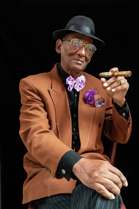 Framed Print : Man seated dressed as 1950s dandy or gangster with fedora hat and big cigar, Havana, Cuba, West Indies, Caribbean, Central America Framed Print : Man seated dressed as 1950s dandy or gangster with fedora hat and big cigar, Havana, Cuba, West Indies, Caribbean, Central America