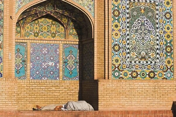 Man sleeping in niche of the Friday Mosque or Masjet-eJam, built in the year 1200 by the Ghorid Sultan Ghiyasyddin on the site of an earlier 10th century mosque, Herat, Herat Province