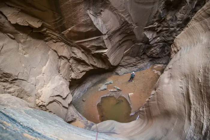 Framed Print : Man standing in a slot canyon after canyoneering, Moab, Utah, United States of America, North America Framed Print : Man standing in a slot canyon after canyoneering, Moab, Utah, United States of America, North America