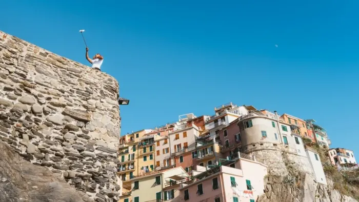 Framed Print : A man taking a selfie at Manarola, Cinque Terre, UNESCO World Heritage Site, Liguria Framed Print : A man taking a selfie at Manarola, Cinque Terre, UNESCO World Heritage Site, Liguria