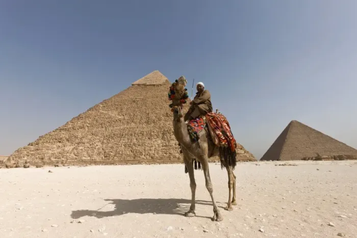 Framed Print : Man in traditional dress on a camel in front of the Pyramid of Khafre in Giza, UNESCO World Heritage Site, near Cairo, Egypt, North Africa, Africa