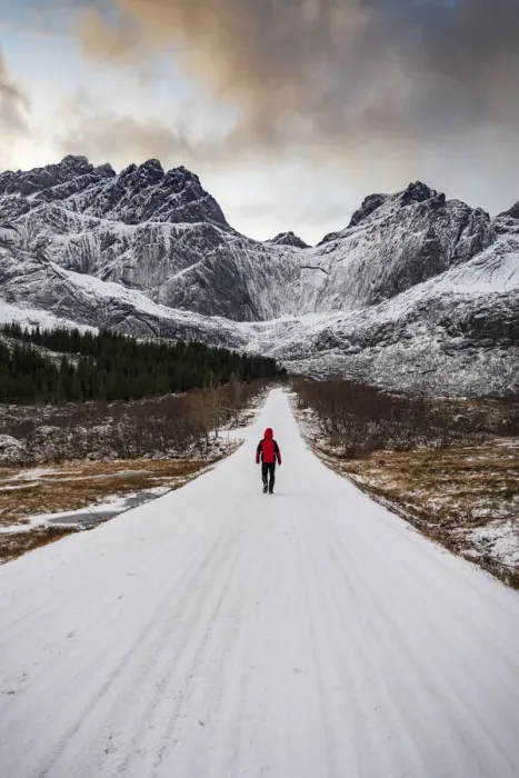 Framed Print : Man walking on empty mountain road covered with snow in winter, Nusfjord, Nordland county, Lofoten Islands, Norway, Scandinavia, Europe Framed Print : Man walking on empty mountain road covered with snow in winter, Nusfjord, Nordland county, Lofoten Islands, Norway, Scandinavia, Europe