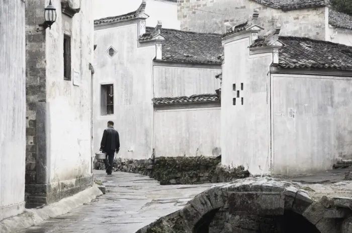 Framed Print : Man walking in the street, Xi Di (Xidi) village, UNESCO World Heritage Site Framed Print : Man walking in the street, Xi Di (Xidi) village, UNESCO World Heritage Site