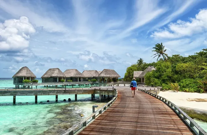 Framed Print : Man walking on a wooden jetty, Baa Atoll, Maldives, Indian Ocean, Asia Framed Print : Man walking on a wooden jetty, Baa Atoll, Maldives, Indian Ocean, Asia