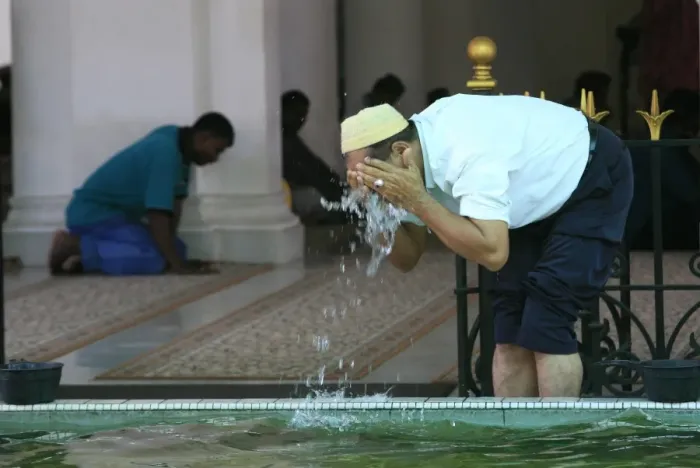 Framed Print : Man washing before prayers, Kapitan Kling Mosque, Penang, Malaysia, Southeast Asia, Asia Framed Print : Man washing before prayers, Kapitan Kling Mosque, Penang, Malaysia, Southeast Asia, Asia