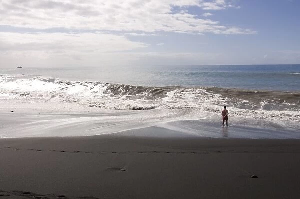 Man watching the ocean at Puerto de Tazacorte, La Palma, Canary Islands
