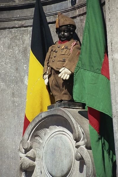 The Manneken Pis in uniform, Brussels, Belgium, Europe