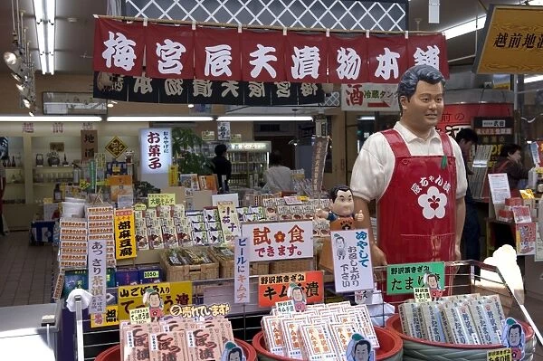 Mannequin of famous Japanese TV personality selling his food products called Tat-chan Zuke at gift shop