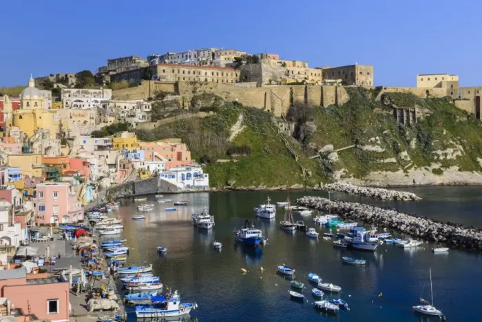 Framed Print : Marina Corricella, pretty fishing village, boats below Terra Murata acropolis fortress Framed Print : Marina Corricella, pretty fishing village, boats below Terra Murata acropolis fortress