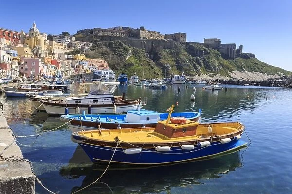 Marina Corricella, pretty fishing village, colourful houses, boats and Terra Murata