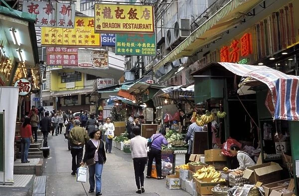 Market area, shops and signs in a street in Soho, Hong Kong, China, Asia