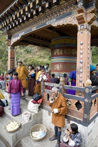 Market around giant prayer wheel, Trongsa, Bhutan, Asia